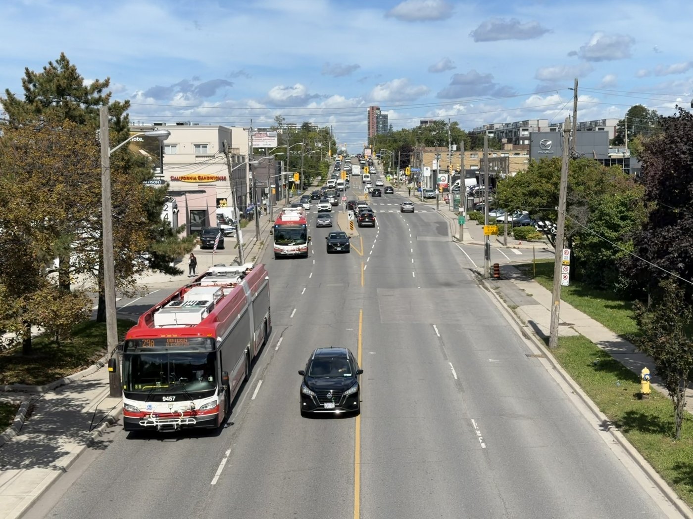 TTC bus 9457 on route 29A, photographed from above on a city street.